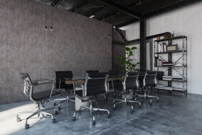 Polished concrete office room, table and chairs