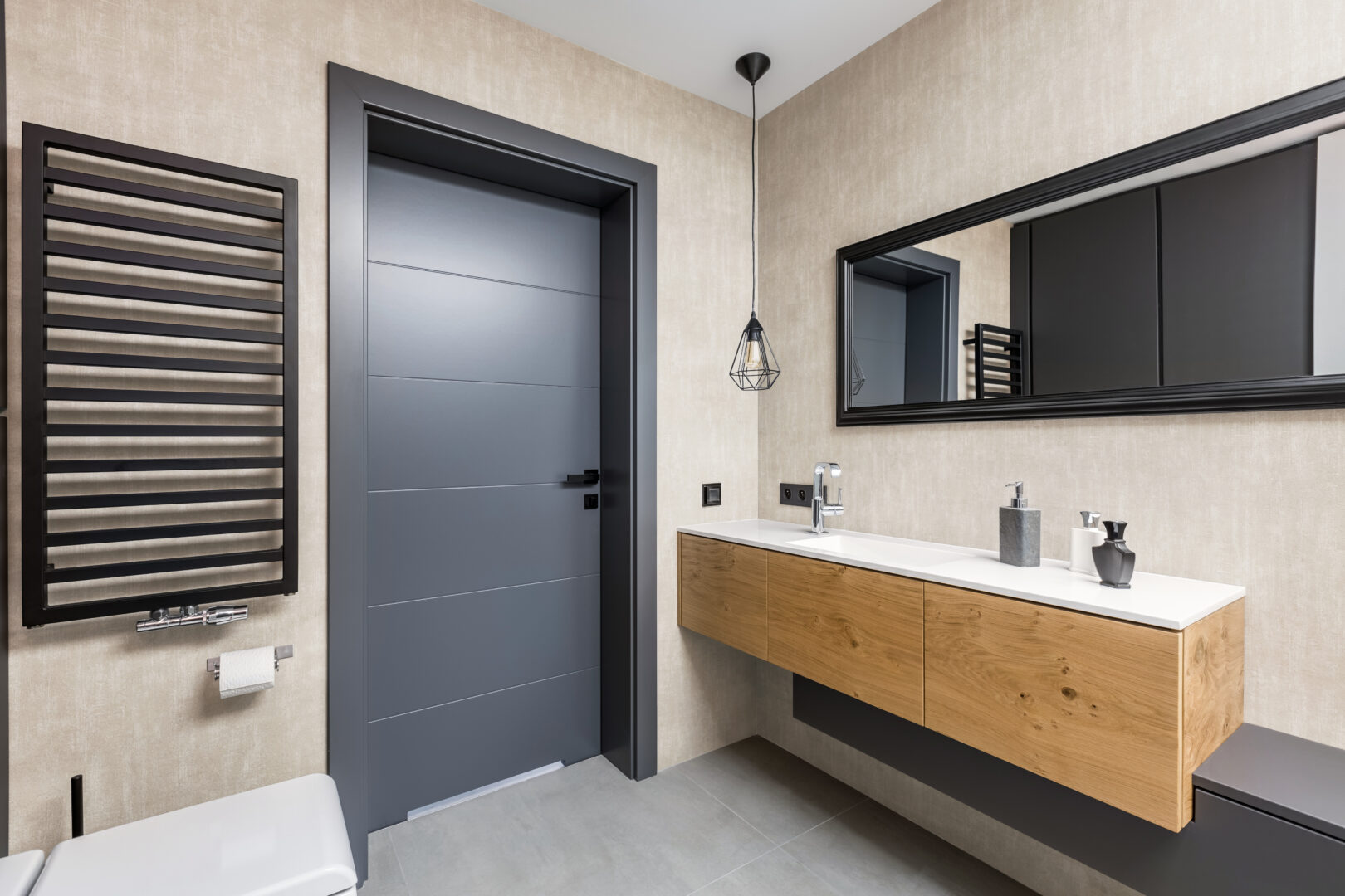 Dark bathroom with countertop basin